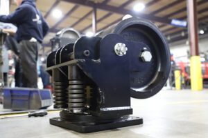 Spring loaded caster
